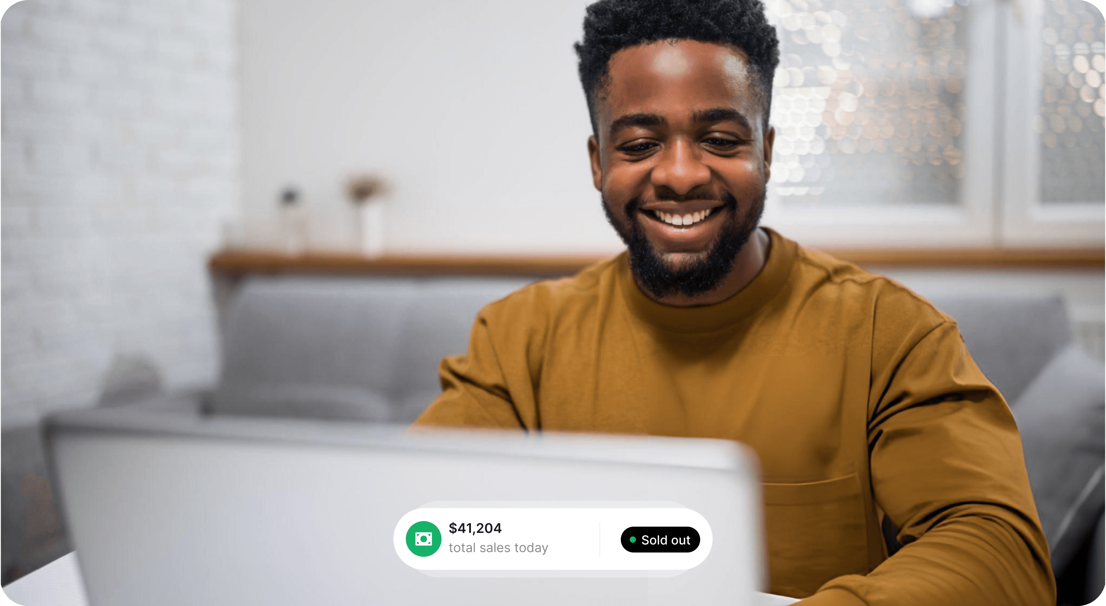 A creator celebrating a sold-out launch as members join